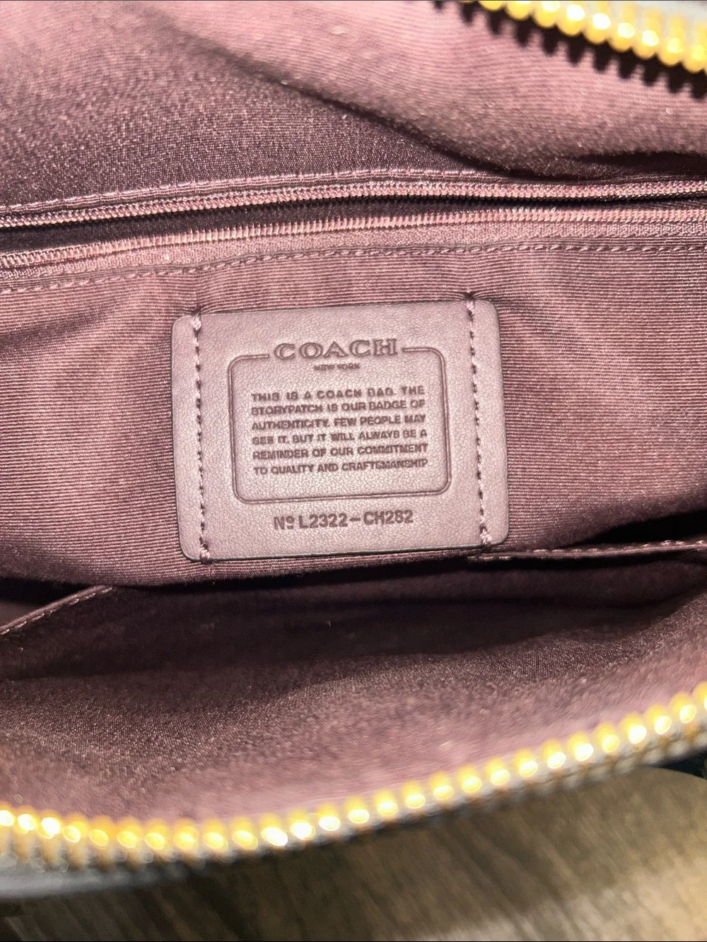 Coach Black Pebbled Leather Satchel with Gold Accents